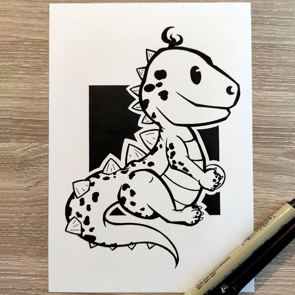 dessin en noir et blanc à l'encre d'un bébé dragon